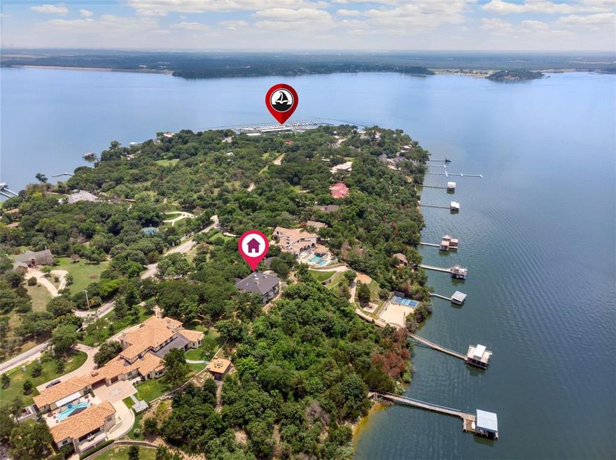 LOCATION, LOCATION, LOCATION. Lake living on one of the most sought-after locations on Eagle Mountain Lake (one of 8 properties located on the gorgeous cliffside of Nationally Acclaimed Boat Club Road). Views like the ones you will encounter at 9957 Boat Club Road cannot be found anywhere else on Eagle Mountain Lake. The almost 3-acre lot has an abundance of mature trees and multiple locations to build a guest home, pool, or more. You will be greeted with floor-to-ceiling views that take your breath away. An entertainers dream. There are multiple entertainment spaces in this classically designed home which has a magnificent Lake View from almost every room. This property has 350 feet of lakefrontage and a dock for a motorboat or sailboat. From the rope swing to the covered terraces, this home is truly like no other. Very rare opportunity.