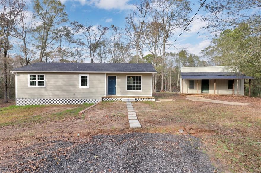 Take a look at this charming updated home on 4.995 Acres in Gilmer, TX and in Harmony ISD! Discover the perfect blend of comfort, privacy, and practical updates in this newly refreshed 3-bedroom, 2-bathroom home offering approximately 1,100 sq.ft. of living space. Nestled on 4.995 lightly wooded acres, this property provides room to roam while remaining convenient to Gilmer’s amenities. Step inside to find a bright, inviting interior featuring fresh paint, new windows, granite kitchen counter, tongue-and-groove flooring, and new carpet. Roof is only 2 years old and there is a brand new survey on file! The home ismove in ready and offers peaceful views of nature from the newly built oversized decks on both the front and back of the home. The outdoor deck space is perfect for morning coffee, outdoor dining, or simply unwinding. The acreage surrounding the home is fenced on three sides and offers a great balance of open area and shade from mature trees. A workshop and storage building provide excellent space for projects, equipment, or hobbies. Home is on community water but also features2 shallow wells for watering livestock or keeping the landscape maintained. Whether you’re seeking a quiet country retreat, a homestead, or room for outdoor recreation, this Gilmer property is a must-see!