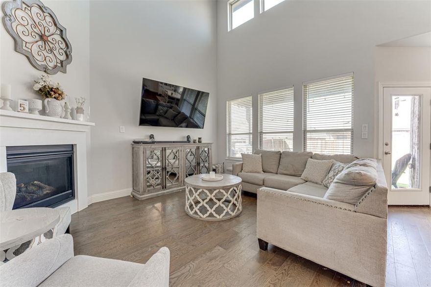 Seller offering $5,000 in concessions to buy down your rate! Beautiful and spacious 2-story Gehan Home featuring 5 bedrooms, 3 bathrooms, a 2-car garage, and so much more! This open-concept layout offers a bright and airy living space with soaring ceilings that extend to the second floor and a cozy gas fireplace as the centerpiece. A grand entryway with high ceilings sets an elegant tone from the moment you walk in.

The kitchen is a chef’s dream with a large island and breakfast bar, abundant cabinetry, recessed lighting, and stainless-steel appliances. A separate dining area seamlessly connects to the family room, perfect for entertaining.

Retreat to the first-floor primary suite complete with a luxurious en-suite bath featuring a soaking tub, dual vanities, walk-in shower, private water closet, and a large walk-in closet. The versatile floor plan includes a converted game room now serving as the 5th bedroom, ideal for guests, a home office, or playroom.

Situated on an oversized lot, this home offers room to relax and play with a large fenced-in backyard and a covered patio, perfect for outdoor entertaining and family fun. Enjoy community amenities including two pools, a splash pad, playground, and monthly neighborhood events. Special financing offer on this home-reach out for more info.