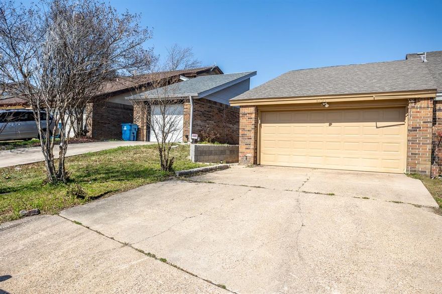 Perfectly located just a short walk to Lake Ray Hubbard, this single-story 2-2-2 townhome is ready for its new family! Open floor plan boasts light & bright with a modern contemporary feel!  The kitchen features updated cabinetry, nice countertops, tiled backsplashes, stainless steel appliances, and breakfast bar.  Kitchen & spacious dining area leads to a very spacious living room complete with vaulted ceiling and a cozy wood-burning fireplace! Gorgeous floors and ceramic tile-no carpet! Split bedrooms for added privacy! The primary suite boasts a single vanity with nice cabinetry, a separate shower and garden tub.  Outdoors you'll find a charming, grassy backyard secured by a privacy fence. This won't last long, so schedule your showing today!