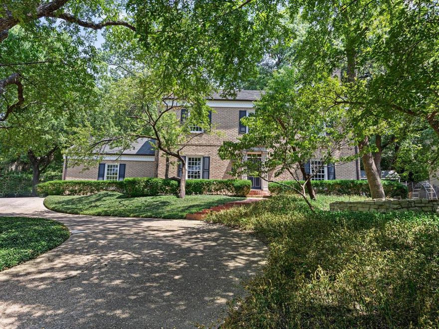 Welcome to this wonderful custom-built, one-owner home nestled on 1.37 acres in the highly sought-after Tanglewood neighborhood, near Colonial Country Club and TCU. This colonial style residence features beautiful hardwood floors, custom moldings, and charming wood-paned windows. The ceilings are 9 foot throughout. Formal living and dining are perfect for entertaining! The den and cozy library provide great spaces to relax. The second floor boasts three bedrooms, including a spacious primary suite with an ensuite bathroom. An enclosed attic offers potential for a playroom! Outside, you’ll find a circular drive, a small outbuilding perfect for a playhouse, and a picturesque wooded lot. Don’t miss this rare opportunity to own a piece of paradise in a prime location.