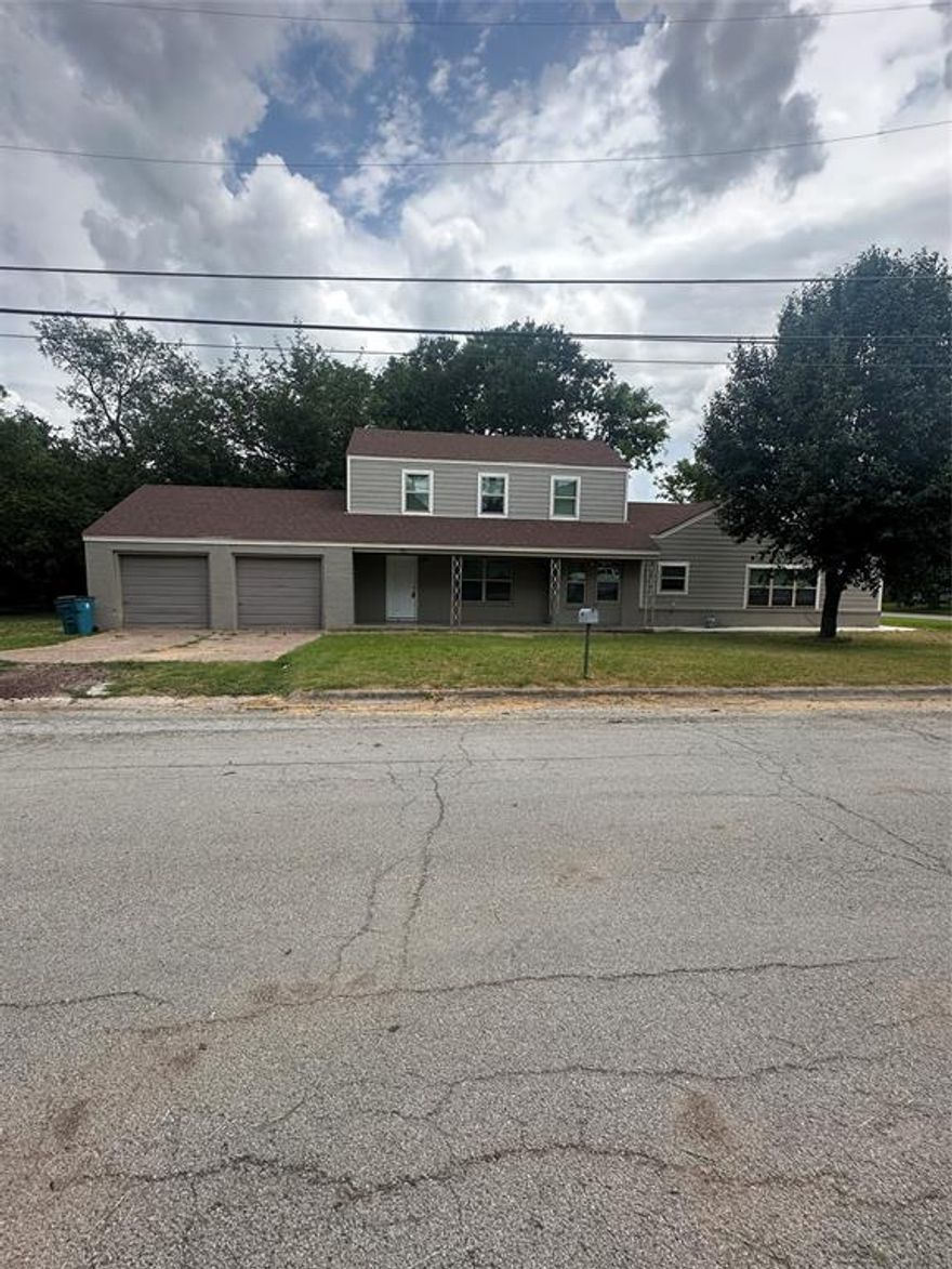 Recently remodeled 4 bedroom, 2 bath home with large living area, kitchen, with an upstairs bedroom or game room. Freshly painted with hardwood floors.  Home has central heat and air. Property has a fenced back yard and is located in a nice location.