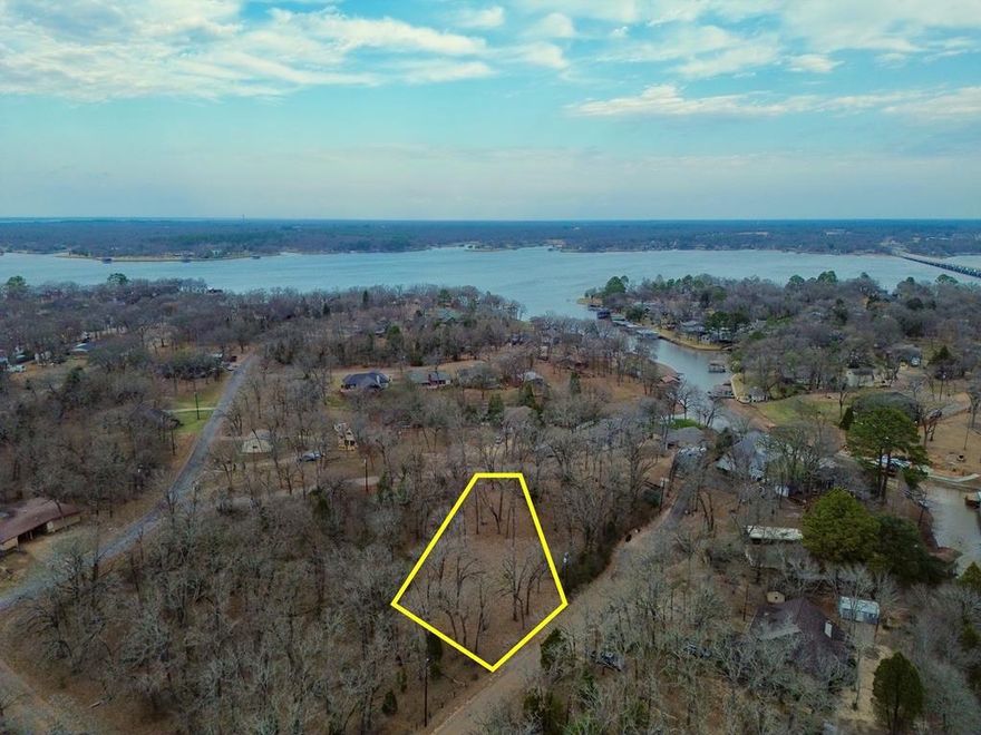 Cleared, surveyed & ready for YOU! Welcome to Point La Vista, one of Cedar Creek Lake’s most sought-after communities! This recently cleared 0.38-acre waterview lot offers the perfect blend of open space and scattered mature trees, providing both beauty and privacy for your future home. Enjoy stunning views of the lake, peaceful surroundings, and all the perks of lakeside living—without the high price of waterfront taxes. Located in a friendly POA, you'll have access to fantastic amenities including a private boat ramp, lakeside park, and sparkling community pool—just steps from your property. Whether you're planning a full-time residence or a weekend retreat, this is your chance to build the lake getaway you’ve always dreamed of.