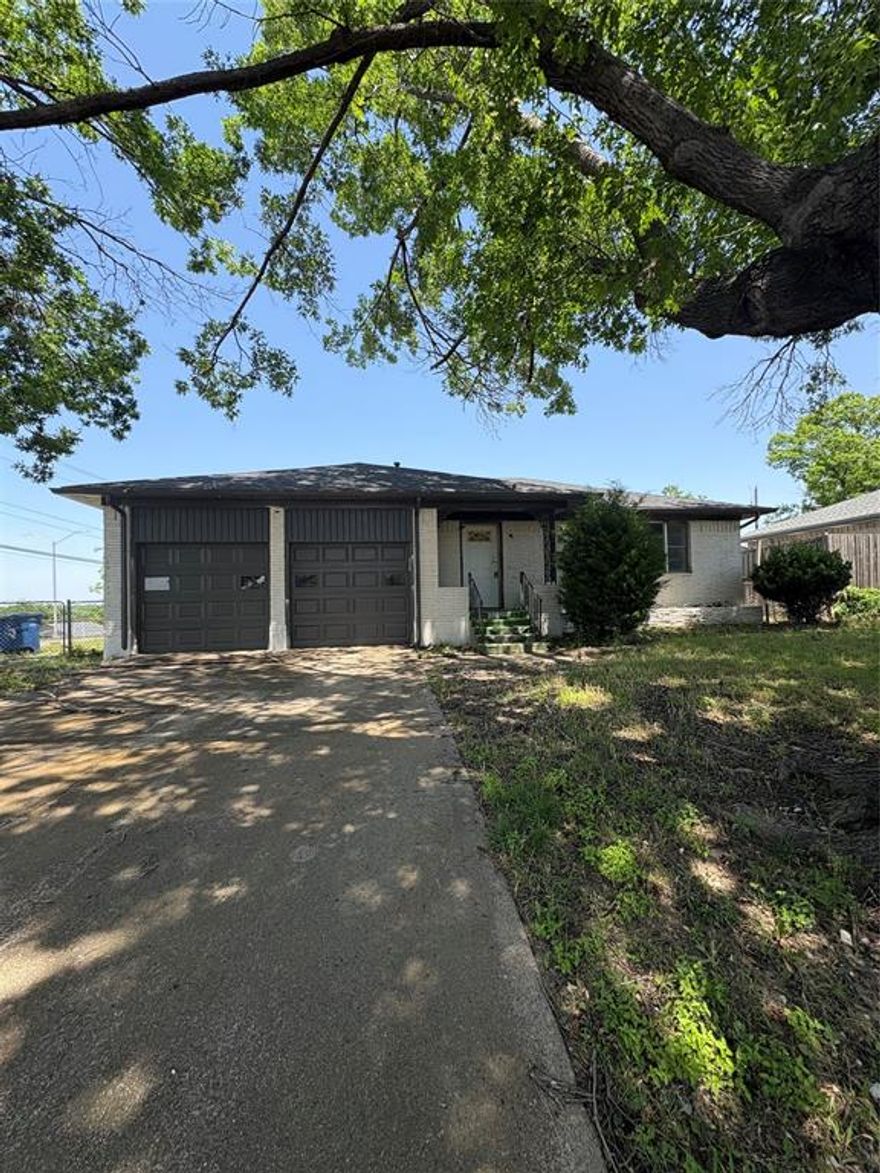 Investor Special! This spacious 4-bedroom, 2-bath home with a 2-car garage is a fantastic opportunity to add value in a peaceful Claremont neighborhood. The open-concept layout connects a bright, airy living room with a kitchen that already features modern cabinetry and a central island—just awaiting your finishing touches. Generously sized bedrooms offer great natural light and potential for personalization. The primary suite includes an ensuite bath with a sleek, modern shower setup, while the second bathroom has stylish tilework in progress. Step outside to a large backyard with a patio area full of potential for outdoor living or entertaining. Property is being sold as-is with partial renovations completed—perfect for an investor or buyer looking to complete a dream project. Don’t miss out on this diamond in the rough!