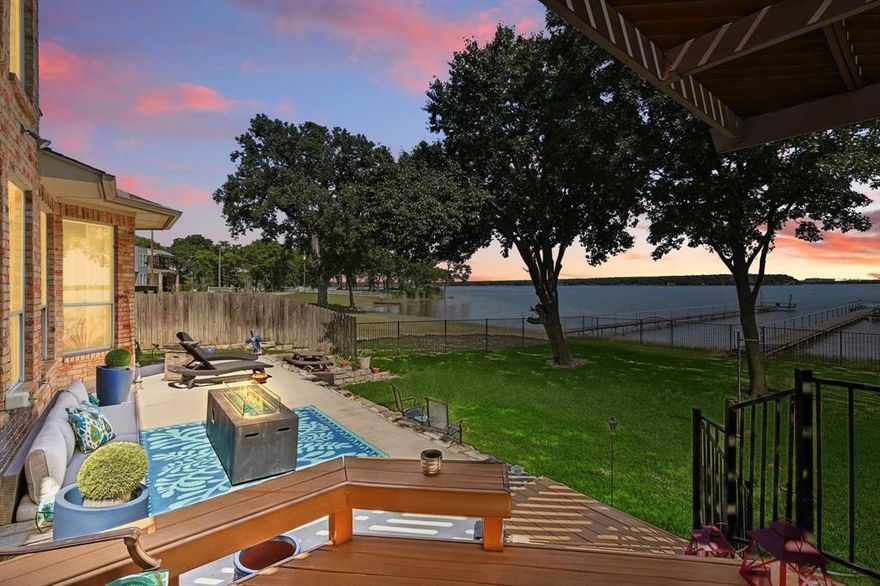 Nestled on the gentle shores of Lake Worth, this stunning 4,400 square foot custom-built home offers the perfect blend of elegance, comfort, and lakefront living. Panoramic water views and private access to the lake, this one of a kind residence is a true retreat for relaxation and entertaining. Step out your back door and onto the beautifully designed patio, perfect for gatherings and evenings by the lake. Private dock ideal for boating, fishing, or simply enjoying the sunsets over the water. The home itself boasts a breathtaking views, gourmet kitchen, a dream laundry room, storage galore, and every bedroom with en-suite bathrooms. This property will WOW you from the moment you pull into the driveway!