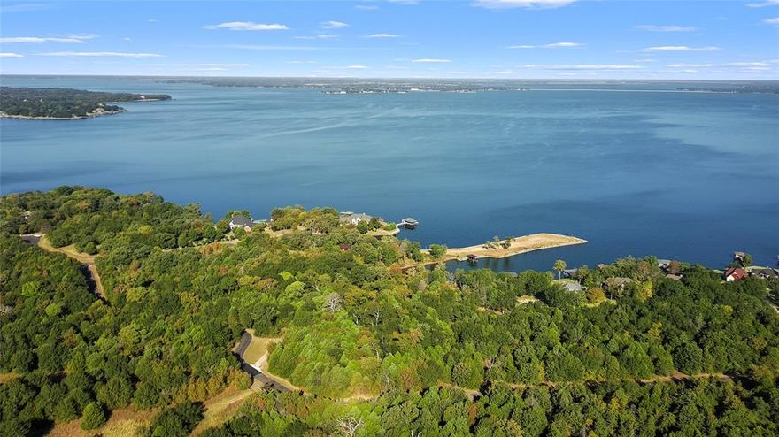 Build your perfect retreat on over an acre of lake-view land!
Located in The Wilderness subdivision, this expansive 1+ acre lot offers beautiful views of Richland Chambers Lake - the third largest lake in Texas. The Wilderness is known for its peaceful atmosphere, stunning scenery, and upscale homes, making it the perfect place to build your dream getaway or forever home. 

Enjoy lakeside living with access to boating, fishing, and water recreation right at your fingertips. With over 330 miles of shoreline, Richland Chambers Lake offers the perfect blend of natural beauty and relaxation, all just a short drive from Corsicana and an easy commute to the DFW area. 

Come experience what lake living is all about! Beautiful views, quite surroundings and room to make it your own. Seller also owns adjoining lots-ask for details.