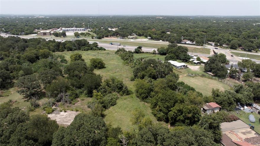 Unlock the potential of this spacious 0.449-acre vacant lot in Fort Worth’s growing southeast corridor. Situated on Vaughn Blvd within the Masonic Home #1 Addition, this property offers over 19,500 square feet of land and is zoned PD (Planned Development), offering flexibility for future residential or mixed-use development (subject to city guidelines and zoning).This lot is ideally located just minutes from Highway 287 N, offering convenient access to major travel routes, downtown Fort Worth, and the surrounding DFW Metroplex. Whether you're an investor, developer, or visionary homeowner, this site presents a unique opportunity in an area experiencing strong redevelopment activity. A survey is available upon request for ease in planning and due diligence. Please Note: Utility availability is currently unknown—buyer to independently verify all utility access and capacity with the City of Fort Worth.