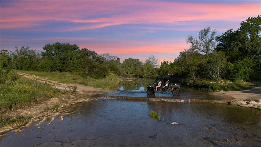 Welcome to this breathtaking ranch property nestled in Clifton, TX, within the picturesque landscape of Bosque County. This expansive 307-acre property offers a wealth of amenities and natural beauty that epitomize the Texas ranching lifestyle.  The crystal clear deep creek that meanders angelically through the property and the gorgeous historical home offers a glimpse into the rich heritage of the area. 

TERRAIN: The terrain of the ranch is diverse and captivating, with significant elevation changes that provide stunning vistas across the surrounding countryside. The balance between wooded and open land is ideal and makes this property feel like it never ends.  You will enjoy tons of mature pecan trees, MASSIVE hardwoods and picturesque trails throughout every inch of this property.  

WATER: The water features of this ranch are jaw-dropping.  Neils Creek goes right through the middle of the ranch with stunning tranquility, views and endless recreational opportunities.  The creek is deep, clear and easily accessible.  There is a perfectly executed concrete low water crossing that offers such a fun place to enjoy this amazing feature of the ranch.  From the tranquil noise of the running water to the smooth rocky bottom you will never want to leave.  There are also two large ponds on the property offering more fishing and welcoming even more wildlife.  

WILDLIFE: Embrace the endless allure of hunting and fishing, with the land providing a haven for whitetail deer, dove, turkey, and various other species, ensuring exhilarating adventures for outdoor enthusiasts.  

IMPROVEMENTS:  This ranch has IT ALL and is turn-key for anyone looking for a place that all the hard work has been done.  There is a gated entry and great fencing throughout.  Once you enter the property you will be welcomed by a historical home that has been intricately updated and is charming inside and out.  There is a very cute guest house as well as a bunk room downstairs and upstairs of the