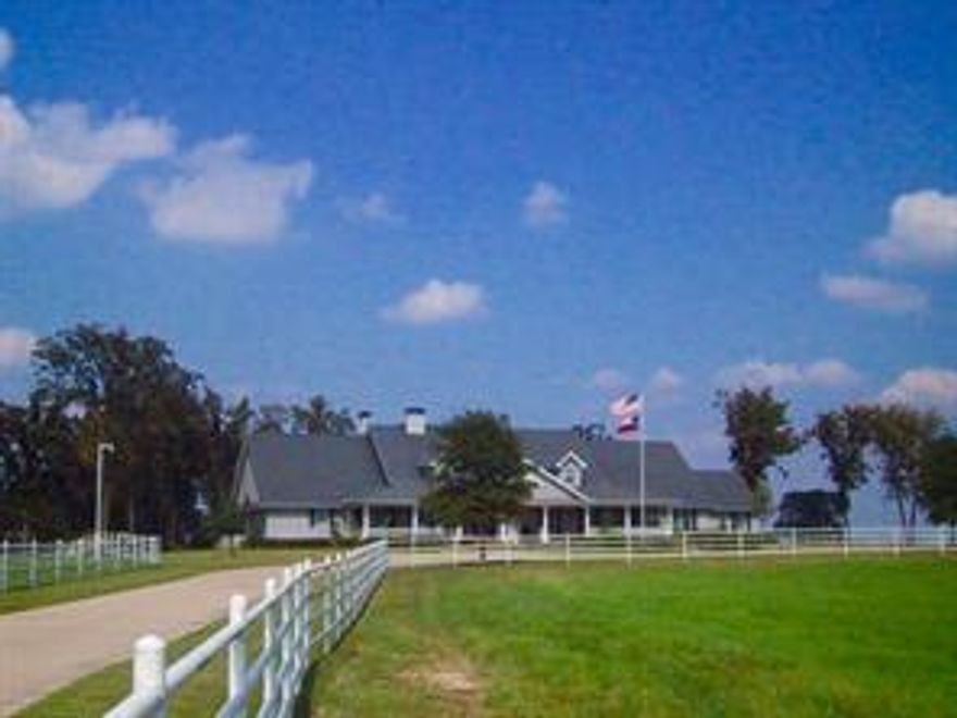 SUMMER HILL FARM is a Showplace just South of Athens.The large home is built to please with 5,986 sf. Big views from the Stately Main Home sitting atop the Hill centered on 63.568 acres of scattered trees, beautiful pastures, 11,200 ft of pipe fence dress up the 3 entrances into this one of a kind offering. The main house has 4 large br suites (incl. master), 4.5 baths. Formal living, formal dining, large den, 2 wood burning fireplaces, impressive office, fabulous kitchen.  There is a constant level 2.5 ac lake. Concrete roads thru the property. Large metal barn can house an RV, travel trailer or bus, 3 large bays.  A guest-caretakers home of 3-3-2. Additional metal storage building for livestock with 3 bays.