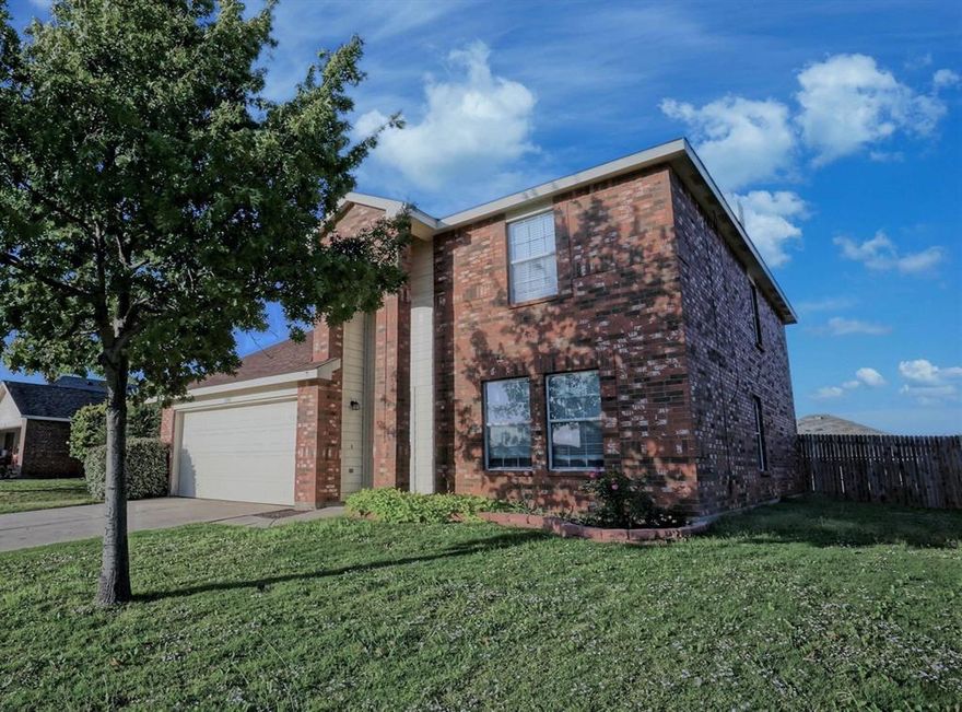 THIS HOME IS ELIGIBLE FOR USDA LOANS! Lots of updates in this 4 bedroom home! The kitchen features stainless appliances, a beverage or wine fridge, large farm sink, and lots of cabinet space. All hard surface flooring downstairs, and Updated decor and colors. Master bedroom has large walk in closet, garden tub, and separate shower.  All secondary bedrooms have large closets. Located in Northwest ISD, with community pool, playground, and sports area.  Huge open patio area with a big backyard.  New fencing being installed. Don't miss out on this one!