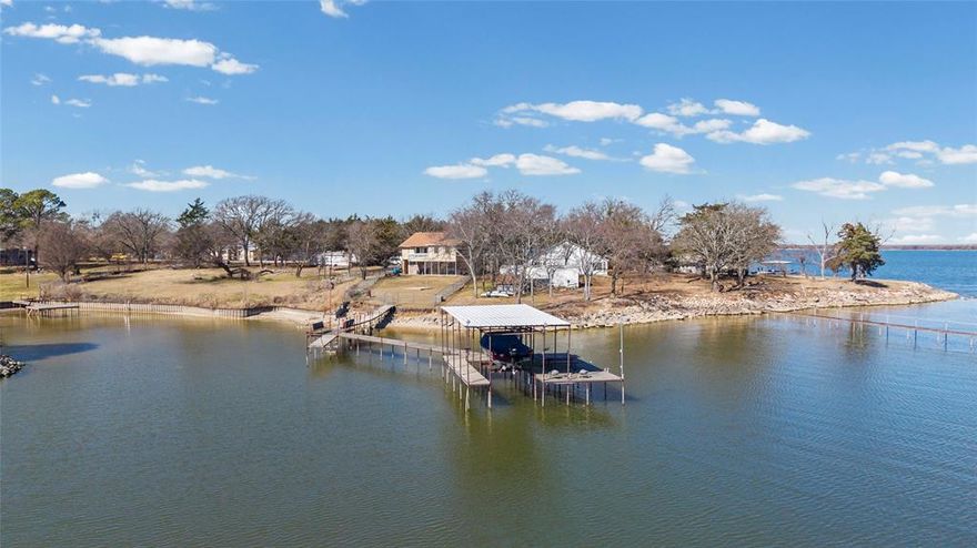 Spectacular Lake View! This 4 bedroom 2.5 bath Lakehome boasts amazing views of beautiful Lake Tawakoni. Lake Tawakoni is a 38K-acre reservoir located in northeast Texas, about 48 miles east of Dallas. It is known for great fishing and recreation. This house is set for vacation rental or just a weekend home for retreat from the big city life. The long pier with fishing and boat dock make it an exceptional find. The electric boat lift makes getting into the water convenient and quick. 
SRA leaseback begins at back of house. 
No expressed or implied guarantees made in this listing. Buyer and buyer's agent responsible for due diligence.