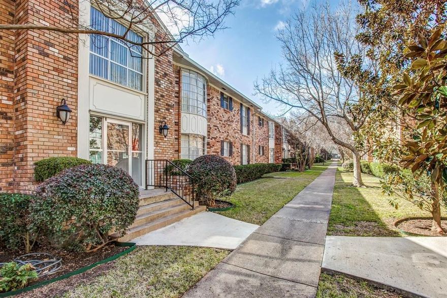 Thoughtfully updated & move-in ready, this spacious top-floor unit offers an ideal blend of comfort, flexibility & location, steps from SMU & Lower Greenville. Featuring an open, versatile layout with multiple living & dining areas—PLUS dual primaries—perfect for roommates seeking a highly flexible floor plan! Freshly repainted (2026) with great natural light pouring in through bay windows enhanced by plantation shutters throughout. The expansive living & dining areas flow seamlessly to a private outdoor balcony through double doors just off the kitchen, which is complete with ample cabinet storage, double ovens & breakfast bar seating. The oversized primary suite includes room for seating, a built-in desk, walk-in closet & ensuite bath, plus new lighting added above the vanity (2026). Secondary bedroom with its own ensuite that is also accessible from the main living areas. Two assigned parking spaces located directly near the rear entrance—a valuable feature in this community. Residents enjoy access to the community pool & clubhouse. Ideally positioned minutes from SMU, Central Market, Greenville Ave shopping & dining—this property offers outstanding livability & investment potential in a central Dallas location!