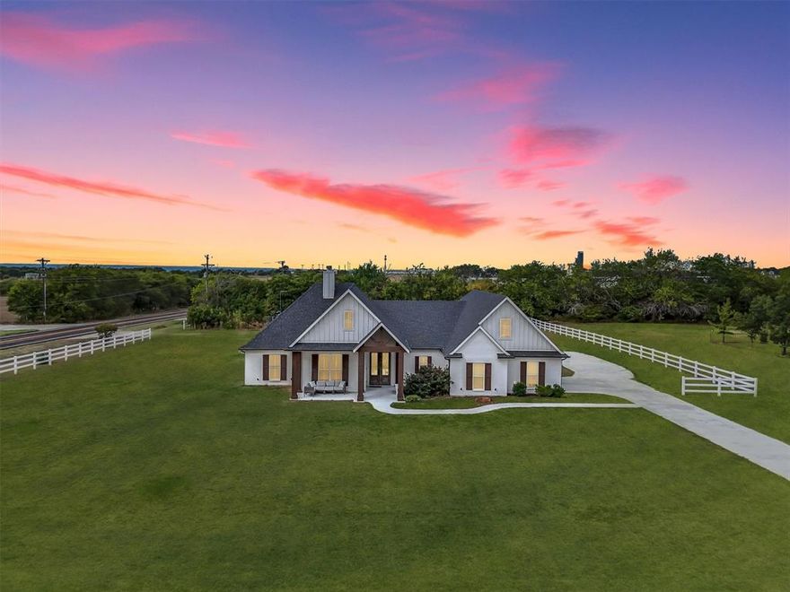Beautiful custom-built modern farmhouse situated on over an acre with no HOA. Built in 2020 by Structures Custom Homes, this 4-bedroom, 2.5-bath home offers an open-concept layout designed for comfortable living and entertaining.

The chef’s kitchen features GE Café appliances, a gas cooktop, oversized island with quartz countertops, and a large walk-in pantry. Spacious living areas include 10-foot ceilings, abundant natural light, and a functional flow throughout the home. Bedrooms are generously sized with custom closets.

The bathrooms feature dual vanities, walk-in showers, and Carrera tile finishes. Step outside to an oversized covered patio with a built-in outdoor kitchen—ideal for entertaining or relaxing while enjoying the peaceful surroundings. A large front porch and expansive backyard provide plenty of room to enjoy country living.

Additional highlights include a side-entry garage with epoxy flooring, iron water filtration system, RV pad with electric and water hookups, propane, and a private septic system.

Enjoy peaceful living with easy access to US-287, offering a convenient commute to Fort Worth, Denton, and surrounding areas. Schedule your private showing today.