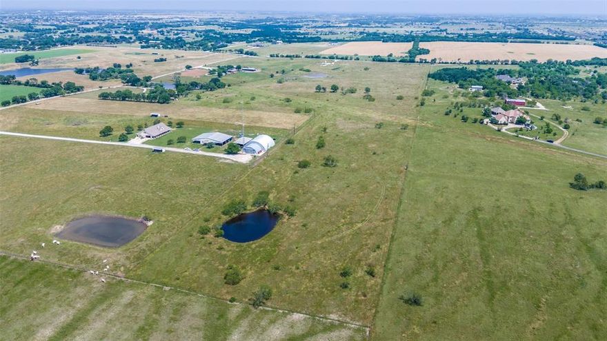 Exceptional Development Opportunity! Located in the highly desirable Northlake ETJ—outside city limits—offering tremendous flexibility for development. Whether you're looking to build a private estate, create a multi-home compound, or pursue commercial or agricultural projects, this property is ready for your vision. The land includes three stock tanks and has a private water well, septic, and electricity already on site—a rare find that adds immediate value. Its location provides the perfect blend of rural charm and convenience, just minutes from shopping, dining, and entertainment. With no deed restrictions and strong growth in the area, this is an ideal opportunity for developers, investors, or individuals seeking space to grow. Don't miss your chance to secure a prime piece of North Texas land with endless possibilities! Home is being sold as is, value is in the land.