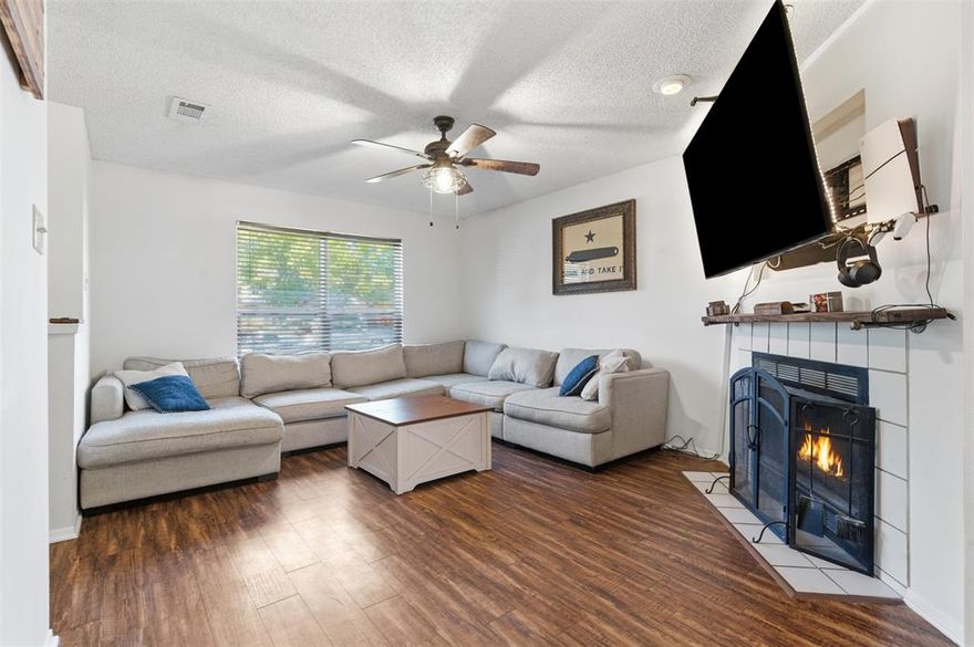 Down a quiet street in Azle seats this home awaiting its new owner! This home is only minutes from the main intersection of town which makes is as convenient as it gets. Whether you're looking to head into Fort Worth, or shop in Weatherford, you'll be there in no time. This well taken care of home has a neutral pallet of colors except for accent walls in two bedrooms, giving them their own flare! No carpet means this house is an easy keeper with kiddos and pets. Bring your big couch because this living room is a great spot to catch the game, or host your holiday get togethers, while the eat-in kitchen houses a large enough space for family dinner. The tall privacy fence lining the large backyard is perfect for playtime or hosting an outdoor evening fire this fall! Modern updates have been made to the two full baths that have brought them to life! The front bedroom is great for a home office with the large front windows, as the other bedroom is next to the master. This home has charm, pride of ownership and original quality of build that makes it great for the next owner.