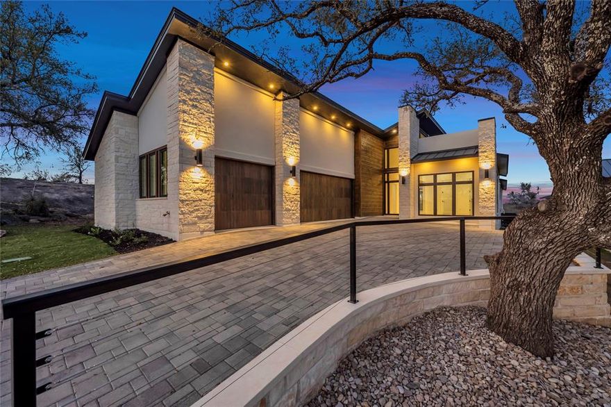 Nestled on the 18th hole of the exclusive Summit Rock Golf Course, this stunning new construction residence built by Crescent Estates is a golfer's dream and an architectural masterpiece. Step into elegance as you enter the foyer, where high ceilings and an abundance of natural light greet you. The gourmet kitchen is a chef's delight, boasting a spacious quartzite island. Adjacent to the kitchen, discover a sophisticated wet bar, ideal for showcasing your collection of fine spirits. A double-sided fireplace serves as a focal point, effortlessly connecting the primary bedroom to a private sitting area with picturesque views of the Hill Country. The outdoor spaces are equally impressive, with two patios that offer breathtaking views of the rolling hills and the manicured greens of the Summit Rock Golf Course. Purchase includes a membership initiation waiver to The Club at Horseshoe Bay at the Summit level, upon application and approval. Up to a $205,000 value.