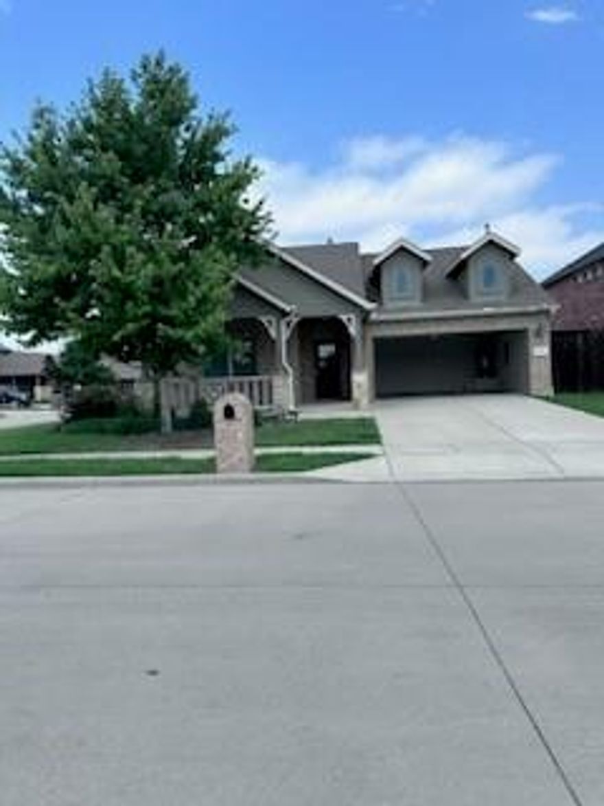 This spacious corner lot three bedroom, two bathroom home has everything you're looking for!  Even a formal dining area that can be used for whatever you need. The gorgeous open-concept kitchen with stainless steel appliances and granite countertops allows you to prepare meals while still being with the family. The large bedrooms and bathrooms are a must-see, also equip with granite countertops. Enjoy tile flooring throughout with carpet in the bedrooms. The carpet in the living area will be replaced with tile prior to move in. Spend time outdoors relaxing in the large backyard under your covered patio on those cool summer nights. Community features include two parks. Conveniently located near shopping, dining, and entertainment.