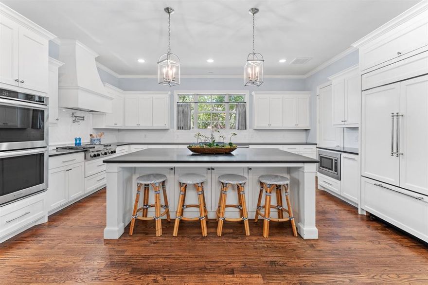 Stunning 5,477 SF two-story home surrounded by lush landscaping and mature trees on an oversized corner lot in Estes Park. Inside, an executive office and a formal dining room flank the entry and lead you into the heart of the home, the great room. Here, living, dining, and cooking combine to create the perfect entertainment space. The chef's kitchen boasts a vast island with seating, built-in fridge, gas cooktop, and ample storage. Peaceful primary suite hosts a sitting area and a spa-like ensuite with dual vanities, soaking tub, walk-in shower, and an expansive closet. A guest suite, one and a half baths, and a laundry room complete the main floor. Upstairs, find a sprawling game room, living room, and 3 well-appointed bedrooms with ensuites. Relax on the covered patio, prepare dinner in the outdoor kitchen, play in the yard, or head out to enjoy all the dining, shopping, and entertainment Southlake offers! Award-Winning Carroll ISD! Money saving water well for yard watering!