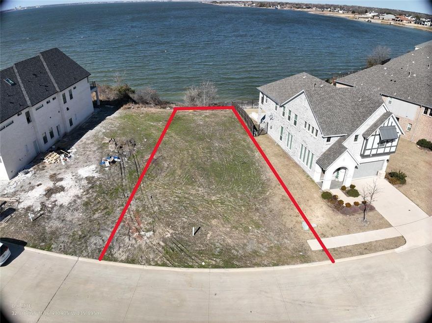 Motivated Seller!
Exceptional opportunity to own the widest lakefront lot in the community, featuring 65 feet of frontage—nearly double the width of surrounding lots—on Lake Ray Hubbard. This is the only lakefront lot in the cul-de-sac that allows construction of a 3-car garage, with additional space for boat and water equipment storage.
Uniquely, this is the only lot with a small private sandy beach directly in the backyard, providing easy walk-in access to the water—perfect for boating, kayaking, fishing, or relaxing by the shore.
Enjoy stunning lake views and the Dallas skyline from your backyard. Imagine peaceful mornings with nature, breathtaking sunsets over the water, and a lifestyle centered around outdoor recreation and tranquility.
This rare property is ideal for building your custom dream home, surrounded by multi-million-dollar residences in the highly desirable Travis Ranch community, offering a wide range of amenities. All utilities are in place and ready for construction, and we can assist with home-building options if desired.
Self-touring available anytime.