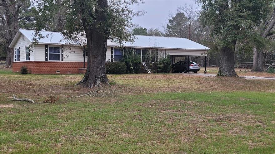 Looking for the best of both worlds, peaceful rural living with quick access to city conveniences?  This property may be the perfect patch. The charming 3-bedroom, 1-bath home sits on just over 8 acres and features a split bedroom layout for added privacy. The floor plan is open and welcoming, with the kitchen flowing directly into the living area. 

An additional detached building offers versatile options; it can be used as a home office, game room, creative studio or private retreat. It was previously used as a barbershop, adding to its character and potential. 

The land itself is a standout feature. The 7-acre tract is fully fenced with barbed wire and includes two access points. It is currently used for horses and cattle. It includes a small, stocked pond ideal for casual finishing or enhancing aesthetics. 

Conveniently located just 10 miles from Tyler, you're far enough away to enjoy true country living while close enough to meet your city needs. 

The property consists of two tracts: 1 acre with the home and 7 acres of land. These will be sold together. A separate 41-acre tract under common ownership, is available, MLS 21126533. The tracts can be purchased together or separately.  The adjacency is available in the pictures