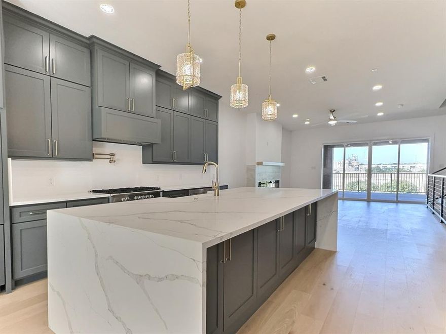 Don’t miss this exceptional opportunity to own a sophisticated three-story townhome perfectly positioned on the waterfront with panoramic views of the Fort Worth skyline and the Trinity River. This elegant residence offers 4 spacious bedrooms, 4.5 luxurious baths, and an open-concept floor plan filled with radiant natural light that enhances the modern, airy ambiance throughout. Contemporary finishes and thoughtful design details elevate every room. The living area features a striking color-changing fireplace, creating the perfect atmosphere for both relaxation and entertaining. The expansive owner’s suite also offers breathtaking views—ideal for morning coffee on the covered balcony or evening stargazing. Additional highlights include a short walk to Top Golf, a brewery, e-bike and Trinity Trails, Wi-Fi capability for secure Amazon deliveries, a tankless water heater, and individual high-efficiency HVAC systems on each floor to maximize comfort and energy savings. Elevator-ready with space allocated for future installation. Located in an exciting, up-and-coming neighborhood, this townhome is not only a beautiful place to live but a smart investment for the future. Multiple units for sale. Schedule your private tour today—this is a rare gem!