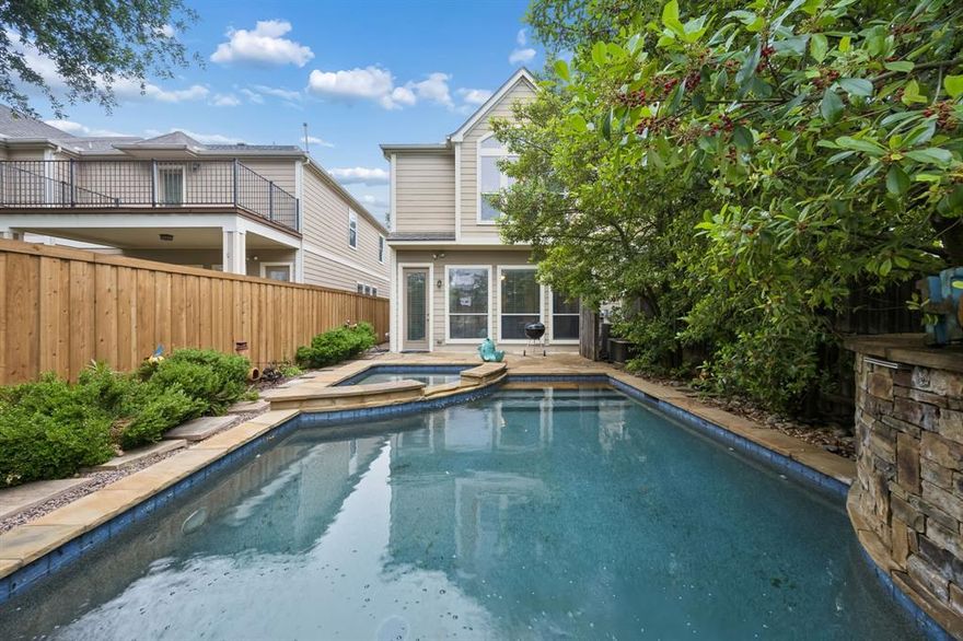 Experience the ultimate lock and leave lifestyle in this stunning, turnkey townhome. Boasting a rare private pool and secluded courtyard, this residence is designed for those who value both privacy and proximity. Inside, soaring ceilings and rich oak hardwood floors lead you through a spacious, open floor plan featuring multiple living areas perfect for entertaining. The chef-inspired kitchen shines with granite countertops and premium stainless steel appliances. Retreat to the oversized primary suite, complete with ample storage and high-end finishes. Modern upgrades include a brand-new wood privacy fence, new roof, upgraded HVAC and an attached garage equipped with a dedicated 200-amp EV charging panel. And No Hoas! Just steps away from the city’s best dining and shopping!
