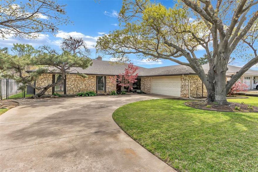 Every house has a unique personality and this one projects a combination of comfort and timeless elegance. This one owner, well maintained mid-century modern designed home located on a quiet , tree lined street in the well established Wedgewood South neighborhood. It sits on a spacious lot with mature trees and beautiful landscaping. The stone and brick exterior with a wide curving driveway leading to the 2 car garage offers plenty of parking. The stunning overed front porch gives this home a lot of curb appeal.  The living area has a gorgeous stone fireplace and windows across the back for plenty of natural light. You will enjoy the 35 foot covered patio for plenty of outside fun and family gatherings.  The gallery style kitchen has ample cabinet space and an eating area over looking the back yard. The formal dining room overlooks the front porch providing soft and natural lighting. The spacious utility room features a half bath. The hall bath is convenient for three of the four bedrooms . The primary bedroom has separate his and hers walk in closets a large bathroom and a door that leads to the back patio. The electrical box was totally updated,  a GAF Timberline Armor shield II roof was installed in 2016 rated for 140 plus winds. The previous owners added sink and counter in garage, home has a Trane AC,  2 water heaters ,  well insulated attic and wood was laid in attic floor for plenty of additional storage. Located close to private schools, public schools medical facilities Hulen Mall and many places to shop and eat. Close to freeways . minutes from I20 .Come see this pretty home, it will be a pleasure to view and even more so a joy to occupy! See all docs in MLS for this home,  foundation roof information and data and sellers offer of credit. This is a great home, com see it . Open houses published . Agents we have no issue send your clients to open house . We are glad to show just tell them to give us your name or a card. Team work is what we believe in.