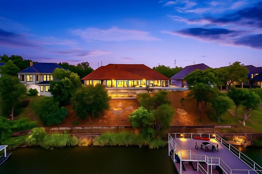 This beautifully recently remodeled 6,100+ sq. ft. Mediterranean-style home sits on three lots with panoramic WATERFRONT Lake Granbury views from nearly every room. Featuring 4 bedrooms, 4.5 baths, 2 fireplaces, a private study, safe room, gym, and a 4-car garage, this custom-built estate combines timeless elegance with modern updates.

Enjoy the chef’s gourmet kitchen, rich wood flooring, and high-end finishes throughout. The resort-style backyard is made for entertaining with a pool, spa, outdoor kitchen, putting green, two water features, electric awnings over the pool. A electric stair lift down to the dock . A private, extra-long boat dock offers direct lake access.