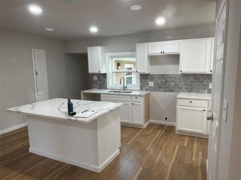 Photo of 1008 Commerce Drive, Greenville, TX 75401 (MLS # 21258351)