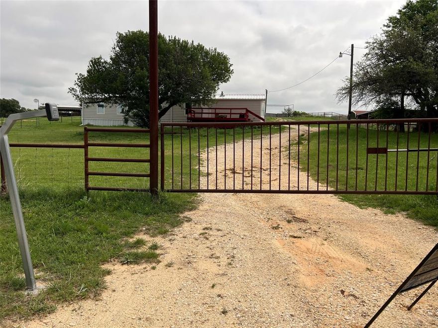 Nestled just outside of Stephenville, this charming small horse property offers the perfect blend of country living and equestrian functionality. Situated on just over 4 acres, the property is ideal for horse enthusiasts or anyone looking for a peaceful rural lifestyle. The 2-bedroom, 2-bath home features new flooring and trim throughout, creating a fresh and inviting interior. Step outside and you’ll find everything you need for your horses, including a 150x250 roping arena and a well-equipped 7-stall horse barn complete with a tack room. The barn is fully serviced with both electricity and water, making daily operations convenient and efficient. Whether you're training, roping, or simply enjoying the open space, this property is ready to meet your needs.