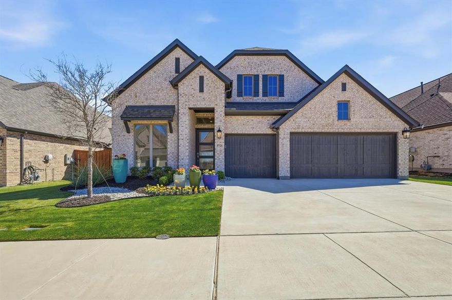 Located in the renowned Ventana neighborhood, this four-bedroom home with a dedicated office offers a functional and well-designed layout. One of the few homes in the neighborhood with elevated views, the property overlooks the city with sightlines stretching from Benbrook Lake all the way to the downtown Fort Worth skyline. The private office sits just off the entry with French doors and a 12-foot ceiling, while the extended entry highlights a coffered ceiling.

The open living space includes a spacious family room with a wood mantel, remote-controlled fireplace, and a wall of windows overlooking the backyard. The dining area connects seamlessly to the kitchen, which features generous counter space, a corner walk-in pantry, and a large island with built-in seating space and additional storage.

The primary suite includes a spacious bedroom with a wall of windows overlooking the backyard. The primary bath features dual vanities, a garden tub, a separate glass-enclosed shower, and two large walk-in closets. A guest suite with a private bath adds flexibility to the four-bedroom layout.

The covered backyard patio backs up to greenspace, guaranteeing no rear neighbors while also allowing you to take in the elevated views. Additional features include a mudroom off the three-car garage, extended attic space for additional storage, and smart home features including a smart thermostat.

The three-car garage is a DIYer’s dream, complete with an industrial air compressor, 220V outlet, and large slat wall storage system. The seller is also willing to include the refrigerator with an appropriate offer.