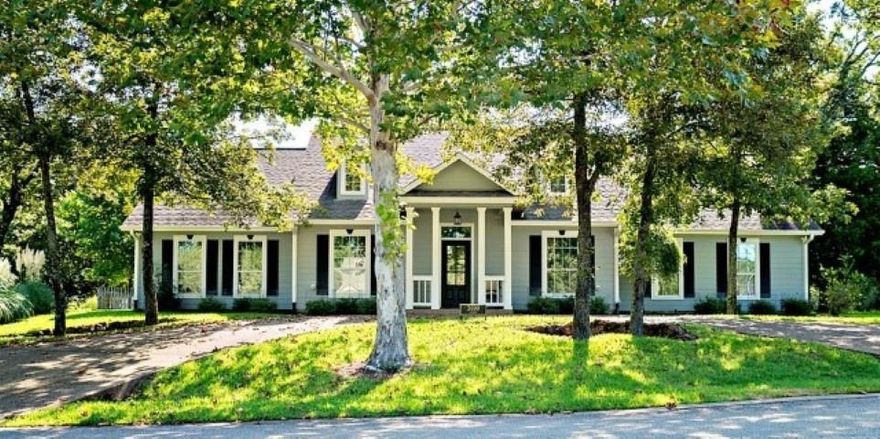 Custom Home in Gated Lake Athens Community - Located in an exclusive gated subdivision on beautiful Lake Athens, this stunning 3 bedroom, 2 bath custom home offers exceptional craftsmanship and upscale finishes throughout. The open floor plan is designed for both comfort and entertaining, featuring spacious living areas, a dedicated office, and generously sized rooms filled with natural light. The gourmet kitchen, elegant details, and thoughtful layout make this home a true standout. A 3-car garage plus additional storage space provides plenty of room for vehicles, tools, and hobbies. Additional features include a storm shelter, generator, fenced backyard, and a greenhouse with electric and water—perfect for year-round gardening. Situated on six lots, there’s ample outdoor space to enjoy. The subdivision offers an impressive array of amenities including a community pool, clubhouse, pickleball courts, park, and fishing dock. Whether you’re looking for a peaceful retreat or an active lifestyle, this home has it all.