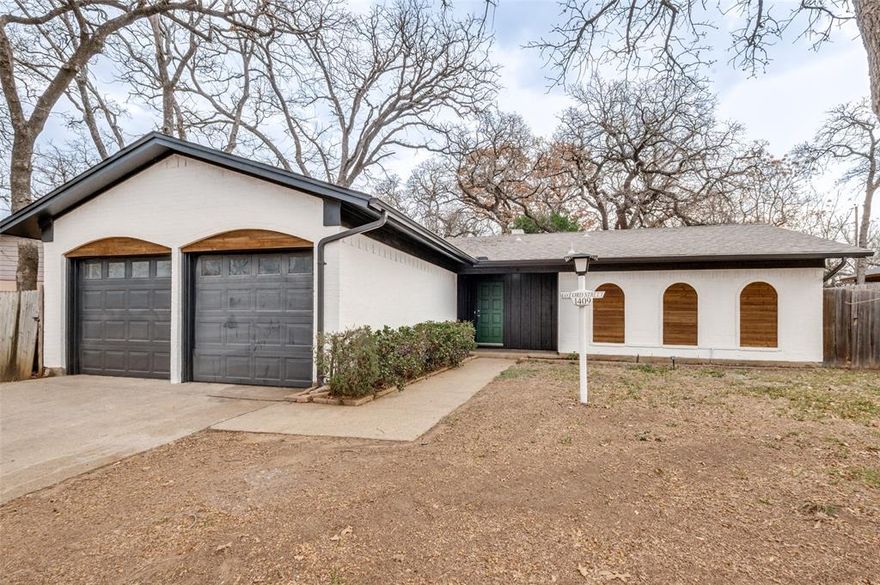 BEAUTIFULLY REMODELED HOME ON HEAVILY TREED LOT! ALL NEW exterior and interior paint, granite countertops, stainless steel appliances, plumbing and light fixtures, tile and MORE! . The front yard boasts beautiful mature trees that welcome family and friends. Inside you’ll find a relaxing family room with a large mid-century modern statement fireplace and sweeping views of large treed backyard.  From the dining room you enter the kitchen and are welcomed with  crisp white painted cabinets, granite countertops and all new stainless steel appliances. The large primary bedroom has an en-suite renovated bath with walk-in shower and granite countertops.  Down the hall the secondary bedrooms are conveniently located just across from the hall bath, also newly renovated.  The patio off the family room and large treed back yard will be great for grilling and entertaining.  Conveniently located near fabulous amenities of Shady Oaks Country Club and Woodland West Park.