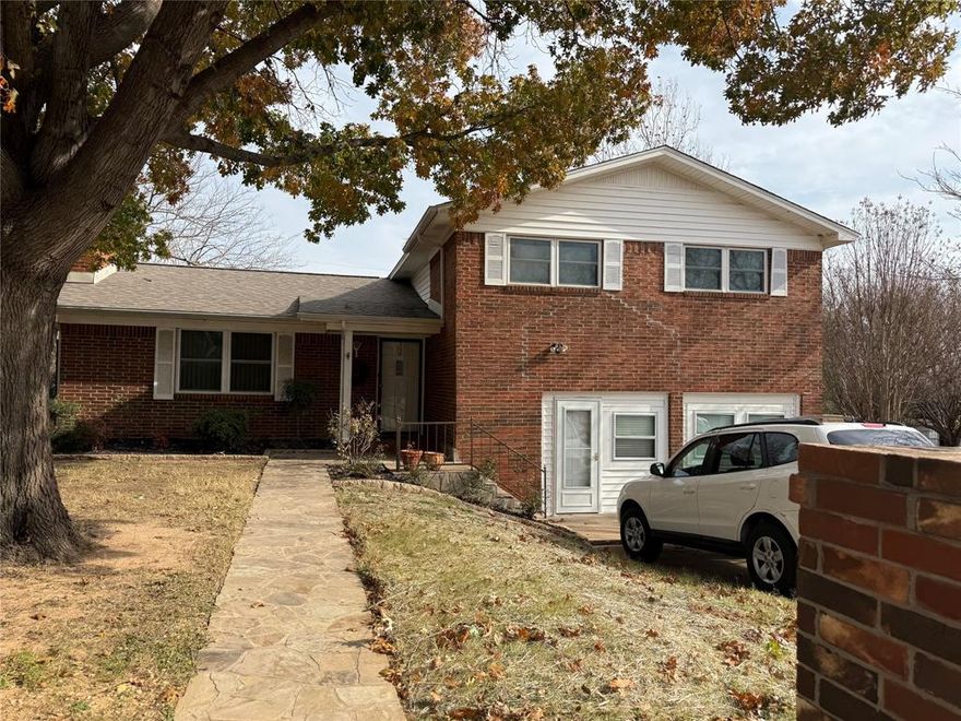 This comfortable family home offers Three bedrooms and Two and half baths, with two inviting family rooms that provide plenty of space to relax or entertain. A cozy gas fireplace anchors the main living area, while the formal dining room is perfect for gatherings and special occasions. Huge Bonus Room currently used as a craft room. Roomy Kitchen and separate utility. Downstairs another room being utilized as the fourth bedroom. Outside, you’ll find a large fenced backyard with a storage shed, plus a covered back porch ideal for enjoying quiet mornings or evening downtime. Fenced and Sprinkler System. Conveniently located close to schools and shopping, this home blends comfort, functionality, and everyday convenience.