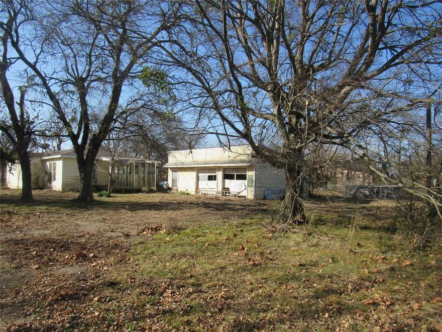 Offering a great oversized lot in one of the most desirable school districts in North Texas!  House is unlivable and it and outbuildings are being demolished, leaving you a great cleared lot with over half an acre for your home on the edge of town with pasture behind and north of you.  This lot has all utilities in place, water, sewer, gas and electric, meters were removed prior to seller purchasing lot. This should make it easier when you are ready to start your build.  This is an established neighborhood with old and new homes alike.  Life is great in a small town with close access to major cities and amenities, Bells is on the edge of fast growing Grayson County IT corridor and only 12-15 minutes to Sherman for medical, retail, dining and higher education.  30 minutes Mckinney and on to the metroplex via Hwy 82 or Hwy 56, 15 min to Bonham going west if looking for the VA hospital.    Owner is also barndo builder if that is what you are looking for, but most welcome to bring your own builder for your dream home or possible duplex.  Buyer to verify all info.