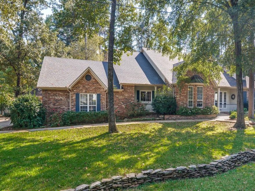 Stunning oversized 3 lot property with tons of trees and heavily landscaped located on a serene street in sought after Hide A Way Lake. See attachment to MLS for more features. Don’t miss this amazing 3500 square foot home with huge pine trees, almost new sparkling pool and hot tub, dry creek, 3 car garage plus detached shop, fire pit and tons of possibilities. Home features a large family room with gas log fireplace, wrap around covered screened patio, stunning views of the pool and property, open to the spacious kitchen with granite counters, breakfast bar, island, updated oven, 4 burner cooktop with side grill, trash compactor, tons and counter and cabinet space, separate breakfast area, half bath, separate dining area, game room or second living with view of the pool, office with built in book shelves and desk, french door to second covered front patio, 2nd full bath down, huge utility room with built in cabinets, counters, sink and linen closet, downstairs primary bedroom with shoe closet, ensuite bath featuring garden jetted tub, huge walk in shower, tons of cabinets and large walk in closet, 3 car attached garage with stairs to large floored attic which could be built out as a study or studio and connected to upstairs hallway.  Upstairs enjoy 3 spacious bedrooms, walk in closets, Jack and Jill bath, linen closet, walk out attics including another potential added room over the living room. Amazing possibilities.  Last but not least, the landscaped backyard retreat with a huge sparkling pool and hot tub, 2 water fall features, custom wood bridge over draw to fire pit, tons of custom decking, iron fencing, large pine trees, heavily landscaped, separate detached workshop with built in cabinets and work bench and so much more.  Exclude: Pool furniture, smoker and griddle, pots, mirror in living room, tesla charger, mounted TVs, washer and dryer, garage freezer, ceiling mounted single garage fan, black shelves in single garage, portable wood workbench,