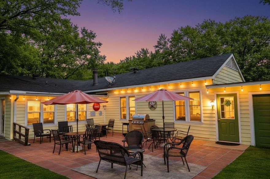 Timeless Charm on Bonham Street - Discover the perfect 1940s character in this beautifully preserved gem. Located in the heart of historic Commerce, 1505 Bonham Street sits on one of the city's most charming tree-lined lots, offering a quintessential small-town lifestyle.  Built in 1945 and meticulously maintained, this 3-bedroom, 2-bathroom residence spans a generous .29-acre lot. Inside, the home unfolds with an open floor plan, designated dining, and two expansive living areas, providing effortless versatility for quiet movie nights or entertaining. The second living area features an elegant electric fireplace, offering cozy warmth and sophisticated ambiance without hassle.  The kitchen features stainless steel appliances for the home chef, durable tile counters, ample cabinetry, an island, and an open-concept flow that connects the cooking, dining, and living spaces perfectly. Each spacious bedroom is filled with natural light and old world charm, while the bathrooms have been thoughtfully kept to preserve the home’s classic roots. Step outside to your expansive backyard entertainer's paradise! The outdoor setup is ready for your first summer BBQ, featuring: A bricked sitting area for starlit conversations, an outdoor grill and sink which can remain with the home, an attached one-car garage plus an additional two-car carport.  Schedule your showing today!