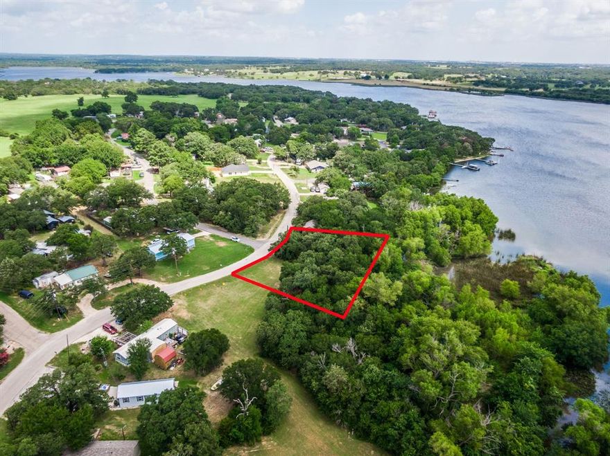 Build your dream lake home! Check out this .372 acre lot available on Lake Alvarado in the Blue Water Oaks subdivision. Property has beautiful trees and open land to build backing up to a small creek that runs into Lake Alvarado. Neighborhood has a community dock just around the corner and the fishing on this lake is amazing. Community HOA includes water and sewer and also gives access to clubhouse and community pool. Fun for the whole family.