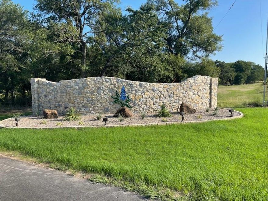 You truly have to take a drive out to Bluebonnet Ridge to appreciate all of its qualities. The developer did not want to disturb the serene and peaceful environment of Mother Nature when he developed this property so he took his time. He also used all small local businesses for all aspects of the development process. You feel like you are miles away from everybody but only 5 miles from the highway. Good news, you can bring your own builder and there's no timeline to build so the land is also a great investment! Even better news- this lot has a the house pad built and ready to build so this saves you money! Go drive around the neighborhood and find a lot to fall in love with, park your vehicle, roll down your windows, and take in the fresh air and peaceful noises, you will not be disappointed. Call our office if you would like a private tour. This community it's truly something special.