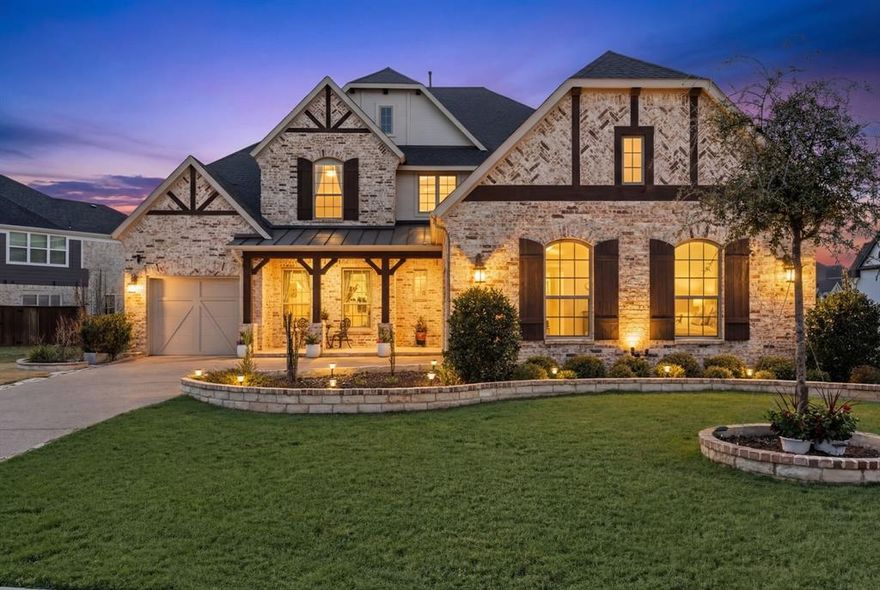 Better than new, beautifully completed, and impeccably maintained. Positioned on a premium oversized corner lot, this over 4,100 square foot residence presents a level of finish, flexibility, and presence that feels intentional from the moment you arrive.

Inside, architectural scale sets the tone. Soaring ceilings, a sweeping curved staircase, and expansive windows create light-filled living spaces that feel both refined and welcoming. The kitchen anchors the main level with generous proportions and effortless flow into the living area, creating an environment designed as much for everyday living as it is for hosting.

The layout is where this home quietly sets itself apart. A dedicated office offers privacy on the main floor. Upstairs, an expansive game room with dry bar and a private media room form a true retreat, thoughtfully separated from the primary suite below. A versatile bonus room with built-ins and a Murphy bed adds flexibility that adapts with ease.

Outdoor living is equally considered. The covered patio extends to a fully equipped outdoor kitchen, while the oversized yard offers room to entertain, unwind, and enjoy the open space that is increasingly rare at this level.

Epoxy-finished garages, finished attic storage, curated lighting, and a cohesive, move-in-ready presentation reflect careful investment throughout. Select furnishings, refrigerators, washer, and dryer are negotiable for a streamlined transition.

Without the wait, the lot premium, or the upgrade invoices.