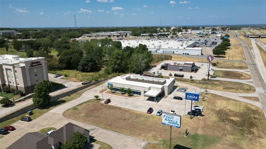 HWY 75 ACCESS ROAD FRONTAGE, this tract of land already has cross access easements in place from Texoma Foot Clinic on the south and DaVita Dialysis on the North.  If you are looking for a super nice small - ready to build on tract of land in one of the fastest growing areas in North Texas, you may have just located it.  Medical, retail, dining, within walking distance, Ford and the new Classic Chevrolet just south with Walmart, Starbucks, Chic Filet, Jack in the Box, McDonalds, Taco Bell, Panda Express, c stores, numerous hotels and so much more within .05 miles.  Survey in documents, don't miss this great opportunity in fast growing Denison TX! 
City of Denison stated access will be off of Hwy 75 access rd for this property, currently access off of Ansley behind Texoma Foot and Ankle.