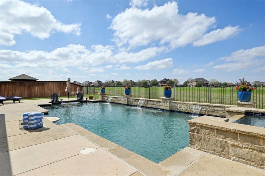 Highly coveted executive home in the luxurious Highlands of Trophy Club with one of the best views on the Trophy Club Golf Course! Fully renovated 5-bedroom, 4-bathroom home ideal for entertaining and enjoying the resort style lifestyle that Trophy Club has to offer. Main level living area and chef’s kitchen with large island has expansive windows with East-West exposure surrounding the home in light. Expansive views of TC's renowned
Whitworth Golf Course, ideally situated away from cart paths & stray balls. Relax in the saltwater pool with waterfalls, a sun deck, and inviting spa with optimal sun exposure daytime while enjoying amazing sunsets. Fully renovated home with updated neutral flooring offers a bright, spacious white kitchen with custom-built cabinets, a large, oversized butcherblock walnut island, large walk-in pantry with current colors throughout. The primary has an updated bathroom, walk-in closet and windows overlooking the backyard to create the ultimate sanctuary. Lrg 2nd bedroom on other side of the house is private and quiet. Main floor office & laundry room with extensive built-in storage. Formal Dining room is light and spacious with pass through coffee bar adjacent to the kitchen. Traverse the stunning circular staircase to secondary living area and 3 large bedrooms. 2 large bedrooms connect with a jack and jill bathroom. Third bedroom on the back of the house offers panoramic views of the 6th and 7th fairways and backyard beautiful retreat. Additional full bathroom off living area. Centrally located minutes to charming downtown Roanoke, Southlake & Westlake's shops & restaurants. Enjoy a 20-minute drive to DFW Airport. Close proximity to Schwab, Deloitte and Fidelity campuses with Excellent schools. Short walk to trails of Grapevine Lake, boat launch, motor cross track, dog park & frisbee golf. Trophy Club Country Club is a golf cart ride away and offers 36 holes of golf, vibrant social network, pool and active pickleball and tennis courts.