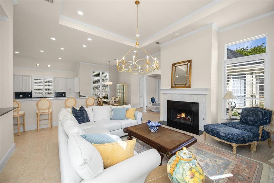 A rare single-story custom home in Addison, this Sharif Munir residence reflects the enduring influence of Caperton Johnson, privately positioned at the end of a quiet cul-de-sac. With 10–14 ft ceilings and abundant natural light, the home blends architectural presence with effortless, lock-and-leave livability.

Open-concept living, kitchen, and breakfast areas feature 12 ft ceilings, expansive windows, and classic wood shutters. The updated kitchen offers white cabinetry, Cambria quartz countertops, and a deep blue tile backsplash, with a discreet gas cooktop tucked into the walk-in pantry for clean sightlines and functionality.

Designed for flexibility, the layout includes a private office, formal dining room with butler’s pantry, and an enclosed sunroom—offering multiple dedicated workspaces or the potential to convert to a third bedroom. A guest suite with a large walk-in closet further enhances functionality.

The spacious primary suite features a bay window sitting area and secure safe-room closet. The spa-inspired bath includes dual vanities, soaking tub, separate walk-in shower, and a large closet with skylight.

Recent updates include new cabinet hardware, Hinkley lighting in the main living areas, updated chandeliers, a new foyer fixture, and a newly added outdoor patio. Additional highlights include an atrium, garden room, full utility room, exterior storage, 22kW whole-home generator, and new roof and exterior paint (2026).

Outdoor spaces offer a private side yard ideal for a dog run and a main yard designed for low-maintenance living. Residents enjoy access to the Addison Athletic Club ($10 lifetime membership) with indoor-outdoor pools, pickleball, fitness center, and more.

Ideally located near the Dallas North Tollway, between Legacy West and Downtown Dallas, with convenient access to Love Field and DFW Airport, plus premier dining, shopping, and entertainment. Meticulously maintained with only two owners.