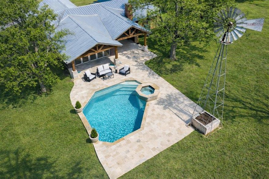 This stunning remodeled 3-bedroom, 2-bathroom custom home offers approximately 2,811 sq. ft. of thoughtfully designed living space, featuring rich wood floors throughout the bedrooms, hallways, living, dining, and kitchen. Nestled on 25 rolling acres just outside city limits, this property provides privacy, space, and breathtaking views. The home boasts an oversized 2-car attached garage, a newer pool and hot tub, and a fully fenced backyard—perfect for pets or children. Designed for both comfort and function, the property includes a 24' x 25' insulated workshop with a 24' x 25' lean-to,  24' x 50' hay storage and horse shelter in front pasture. The land is dotted with mature trees, offering shade and beauty, while the open pastures, wooded areas, and two stocked ponds make it ideal for ranching, hunting, or equestrian activities. A working windmill that sits by the pool, and a storm shelter provides peace of mind. With plenty of room for an arena and show barn, this incredible property offers endless possibilities for those looking for a rural retreat with all the modern amenities. Don't miss this rare opportunity to own a piece of Texas countryside with stunning views and unmatched potential! With Highway 82 frontage, ample acreage, and no city restrictions, this property is well suited for an equestrian estate, training facility, hobby ranch, or private country retreat in a highly desirable North Texas location. Opportunities like this are limited—schedule your private showing today to fully experience the land, views, and equestrian potential this property offers.