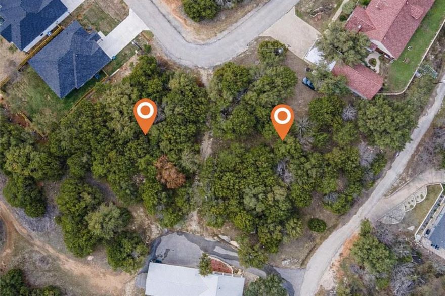 An exceptional opportunity to build your dream home!  Create your ideal retreat on two stunning lakeview lots in the gated Canyon Creek community. Nestled among mature trees, these homesites offer scenic views and a serene setting perfect for a custom build designed to capture the beauty of the lake. Water and sewer are conveniently available at the street. Enjoy access to all community amenities.