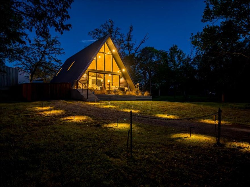 Elevated open water views pair with lake access at this A-frame retreat in a Cedar Creek Lake community with a neighborhood boat ramp and dock providing convenient access for fishing, boating, and enjoying the water. Currently operating as a successful short-term rental, this property offers an excellent opportunity as a weekend getaway or income-producing investment.

The 1725 square foot, 3 bedroom, 2 bath layout is thoughtfully designed to maximize space and functionality, with two bedrooms and a full bath downstairs, ideal for guests. The open living area features soaring ceilings with modern wood detailing and flows into a well-appointed kitchen and built-in bar space perfect for gathering and entertaining. The main level offers low-maintenance sealed concrete floors and thoughtfully integrated storage throughout.

Upstairs, a loft area at the top of the stairs provides a flexible space for a workspace, reading nook, or games area. The private primary suite is separated by a door for privacy and includes its own full bath, hardwood floors, and full-size closet.

Luxury finishes are carried throughout, including waterfall countertops, upgraded fixtures, and modern walk-in showers in both bathrooms.

Exterior features include a board-on-board cedar privacy fence creating a great yard space for pets or play, and gravel driveway.

Located just over an hour from Dallas and near local favorites including Fig’s Backyard, Fig’s Steakhouse, Whatz-Up Fun Park, Cedar Creek Brewery, Triple N Winery, and boat rentals at Lone Star Marina, this property delivers the ideal Cedar Creek Lake escape with built-in investment potential. Furniture package available separately.