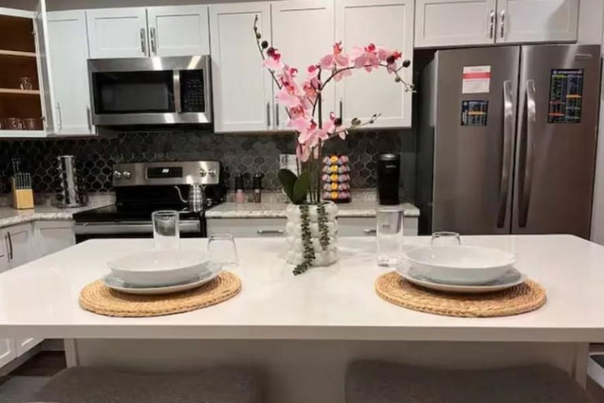 Step into comfort and convenience with this beautifully updated corner unit overlooking the sparkling community pool in the highly desirable Oak Lawn area. Unit 267 welcomes you with abundant natural light and an open layout that flows effortlessly into a fully renovated kitchen featuring brand-new cabinetry, a sleek quartz island, stainless steel appliances, and a convenient stackable washer and dryer—bringing modern functionality to the heart of the home. Large windows frame relaxing views of the courtyard and pool, enhancing the peaceful atmosphere throughout. The spacious bedroom offers a quiet retreat with generous closet space, while the updated bathroom showcases clean, contemporary finishes. This fully gated community provides an added sense of privacy and peace of mind, along with secured covered parking for effortless day-to-day living. Outside, residents enjoy lush landscaping and the beautifully maintained pool just steps away. Located minutes from Love Field, Uptown, the Medical District, and major highways, this condo combines comfort, style, and unmatched accessibility. Whether you're a first-time buyer, frequent traveler, or investor seeking a low-maintenance property in a prime Dallas location, this home delivers exceptional value. This unit is currently rented for $2200 a month for a mid term rental.