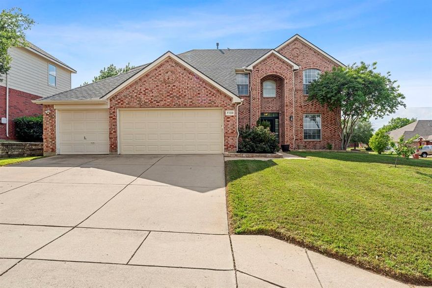Beautifully updated home on a corner lot with a rare 3-car garage, located next to a park with a pond and playground. This 4-bedroom, 2.5-bath home features an open-concept layout with vaulted ceilings, a cozy fireplace, and abundant natural light. The completely remodeled kitchen offers a large island with seating, stainless steel appliances, and ample counter space, flowing seamlessly into both dining areas. The downstairs primary suite includes a fully renovated bathroom with dual sinks, a separate shower, and a spacious walk-in closet. Upstairs offers additional bedrooms, a full bath, and a large game room. Step outside to an oversized backyard with turf, a putting green, and a pool—perfect for entertaining.