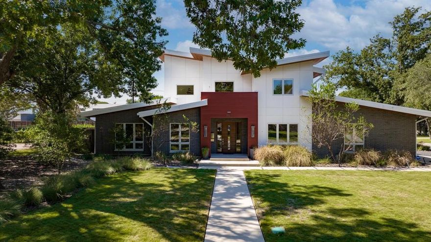 Located on an expansive corner lot in the private school corridor, this custom built warm contemporary home was designed for the entertainer & art collector who appreciates the value of a zero energy ready home. Upon entering your eyes focus on the one of a kind art glass ceiling that leads you to the study on the left & formal dining on the right. Ahead the full wet bar is located before the expansive family room with 2 story ceilings, custom art lighting, dual sided fireplace all open to the kitchen. The chef designed kitchen features maple cabinets, large kitchen island, & high-end appliances.The primary suite enters into a zen like bath with dual sinks, large soaking tub, double walk-through shower & walk-in closet. An additional downstairs guest room overlooks the backyard & adjacent to the all seasons room that allows you to enjoy the incredible outdoor spaces including the lap pool. Upstairs has a multi use living space, third guest suite with bath & theatre room. 8 HERS Rating