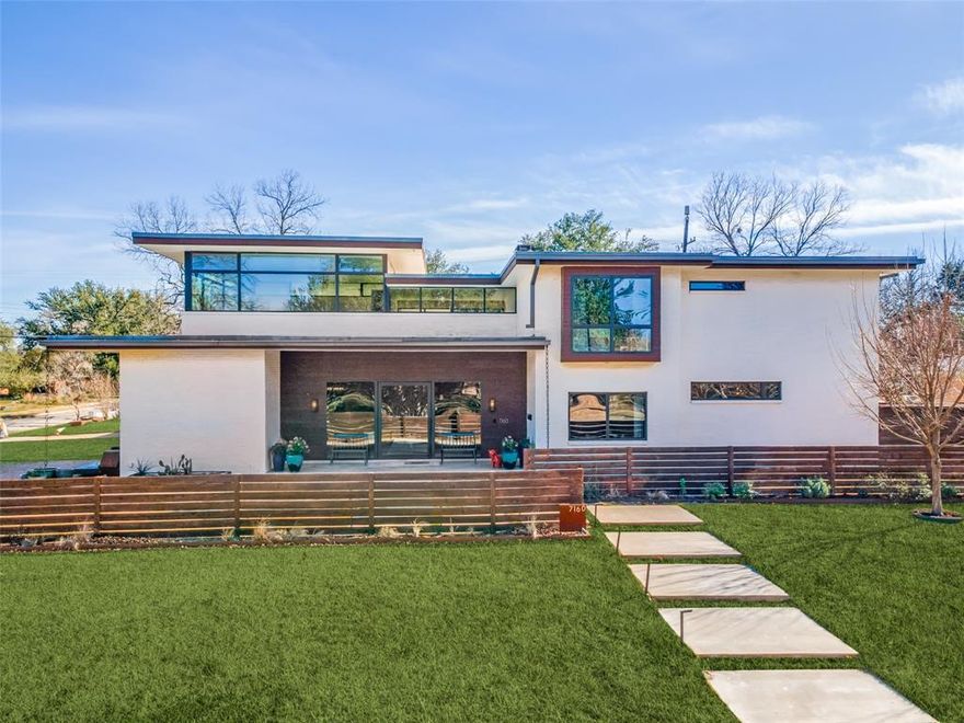 Taken to the foundation, and studs, this W-2 Studio renovation boasts uncompromising architectural light filled design, incredible function, and unique and timeless contemporary design. Complete with five bedrooms, five full bathrooms, as well as first floor primary suite with additional bedroom down that could work as nursery, office, or flex space. The open space design offers great separation of space, for both entertaining and awesome family gatherings. The kitchen offers abundant and well laid out Walnut cabinetry, large island-peninsula workspace with six burner Viking professional range and additional oven, warming drawer, micro-wave and Miele built-in coffee bar. The kitchen opens to the spacious living with wet-bar and wood burning fireplace, incredible wall of Walnut built-ins, as well as overlooking backyard, pool and outside living via multiple 8 feet doors and light filling windows. The upstairs offers three bedrooms and three full baths as well as huge upstairs living with access to massive patio balcony space overlooking pool and backyard, as well as separate media room off south side of balcony-patio space. The home also is complete with guest quarters or mother-in-law suite off outside patio space overlooking pool with separate entry. Additional amenities include two utility rooms both up and down, four zones of HVAC, multiple tankless water heaters, heated pool and spa, landscaped and sprinklered grounds, just blocks to White Rock Lake and park, and award-winning Lakewood Elementary.